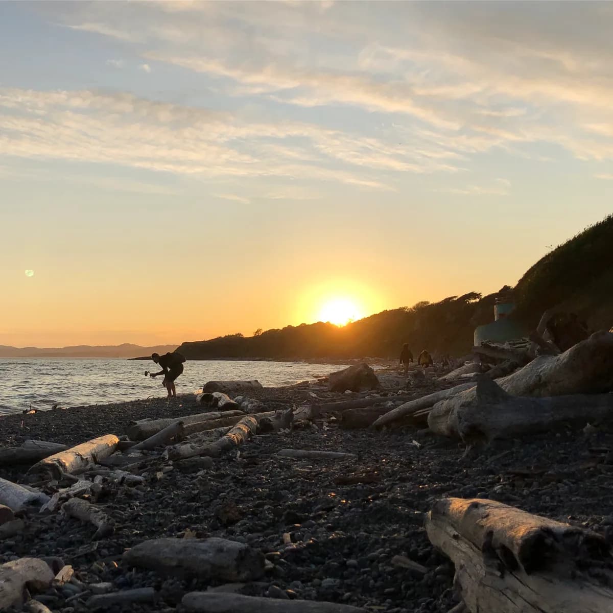 Sunset over Spiral Beach on the Dallas Road waterfront in Victoria, BC — the local market Motiv Creative Labs serves with custom website design and development
